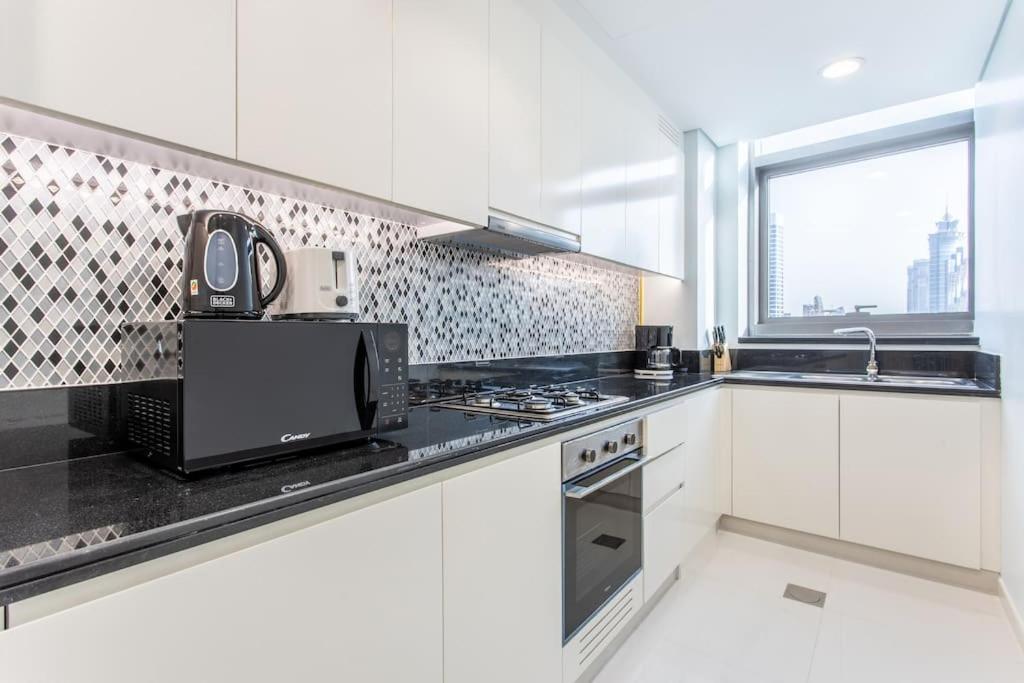 דובאי Paramount Hotel Midtown Flat With Burj Khalifa View מראה חיצוני תמונה